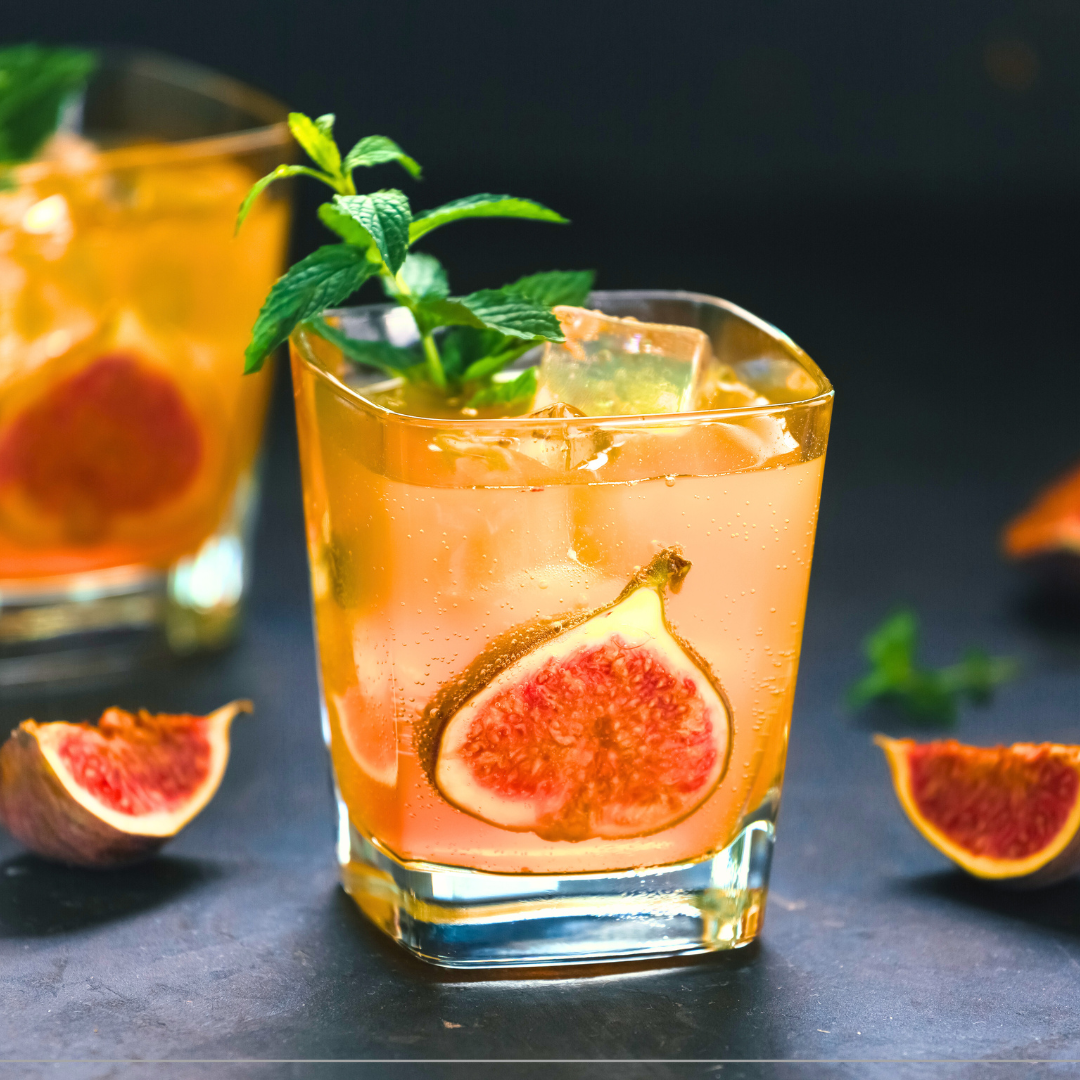 Mocktail drink with fig garnish