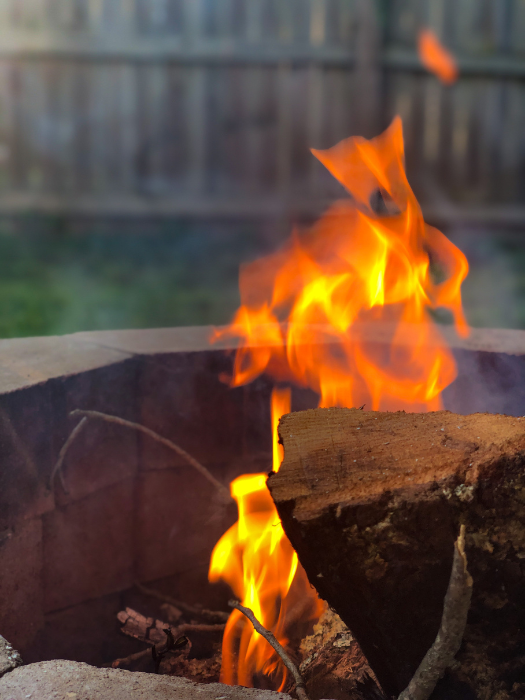 Logs burning in a fire pit