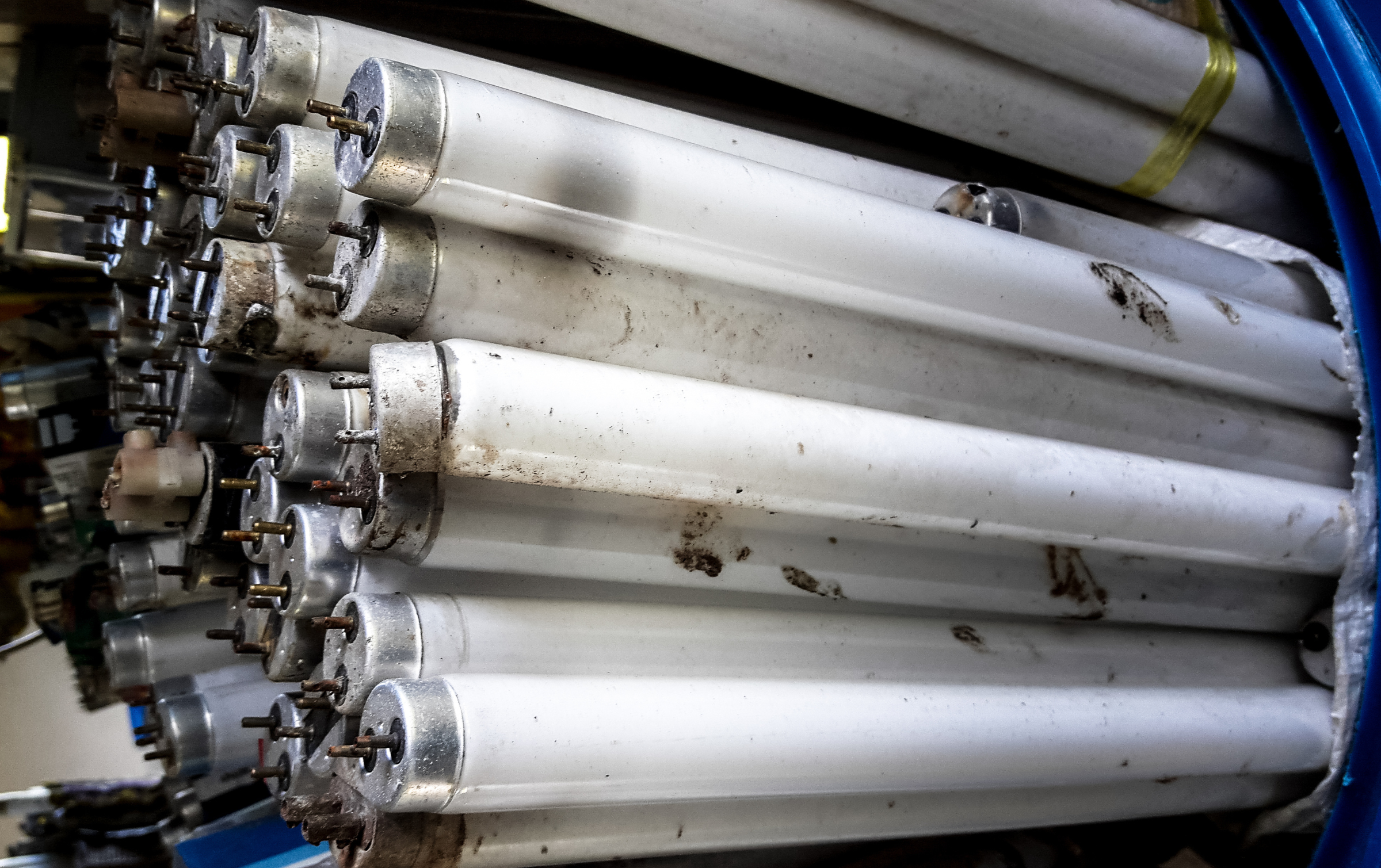 Large quantity of used fluorescent bulbs