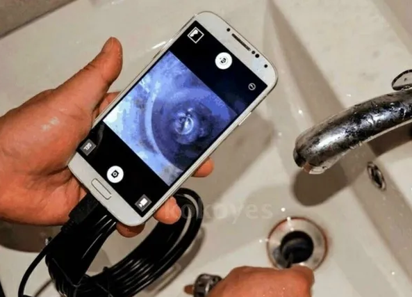 looking down sink drain with wireless endoscope camera